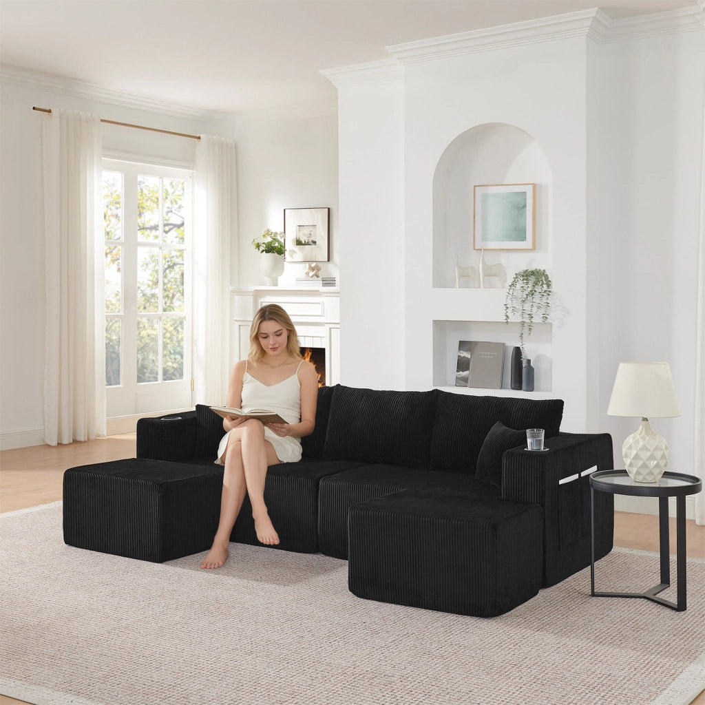 Divano angolare modulare 3 posti con pouf mobili portabicchieri tasche laterali e cuscini in velluto a coste nero