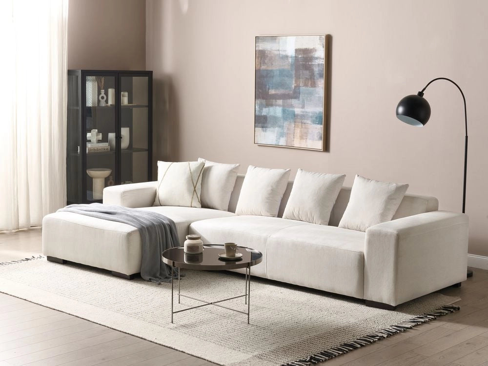 Divano angolare 4 posti in velluto a coste bianco sporco lato destro forma a L stile elegante