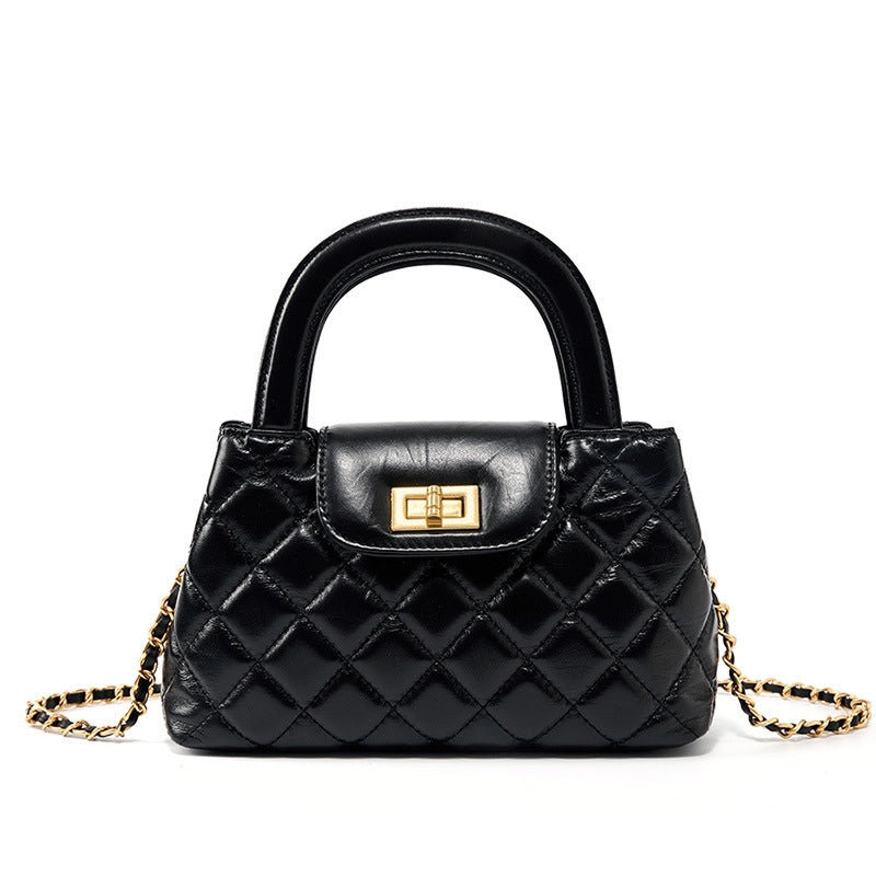 Borsa a tracolla da donna in vera pelle, capiente e di grande capacit¨¤, colore nero.