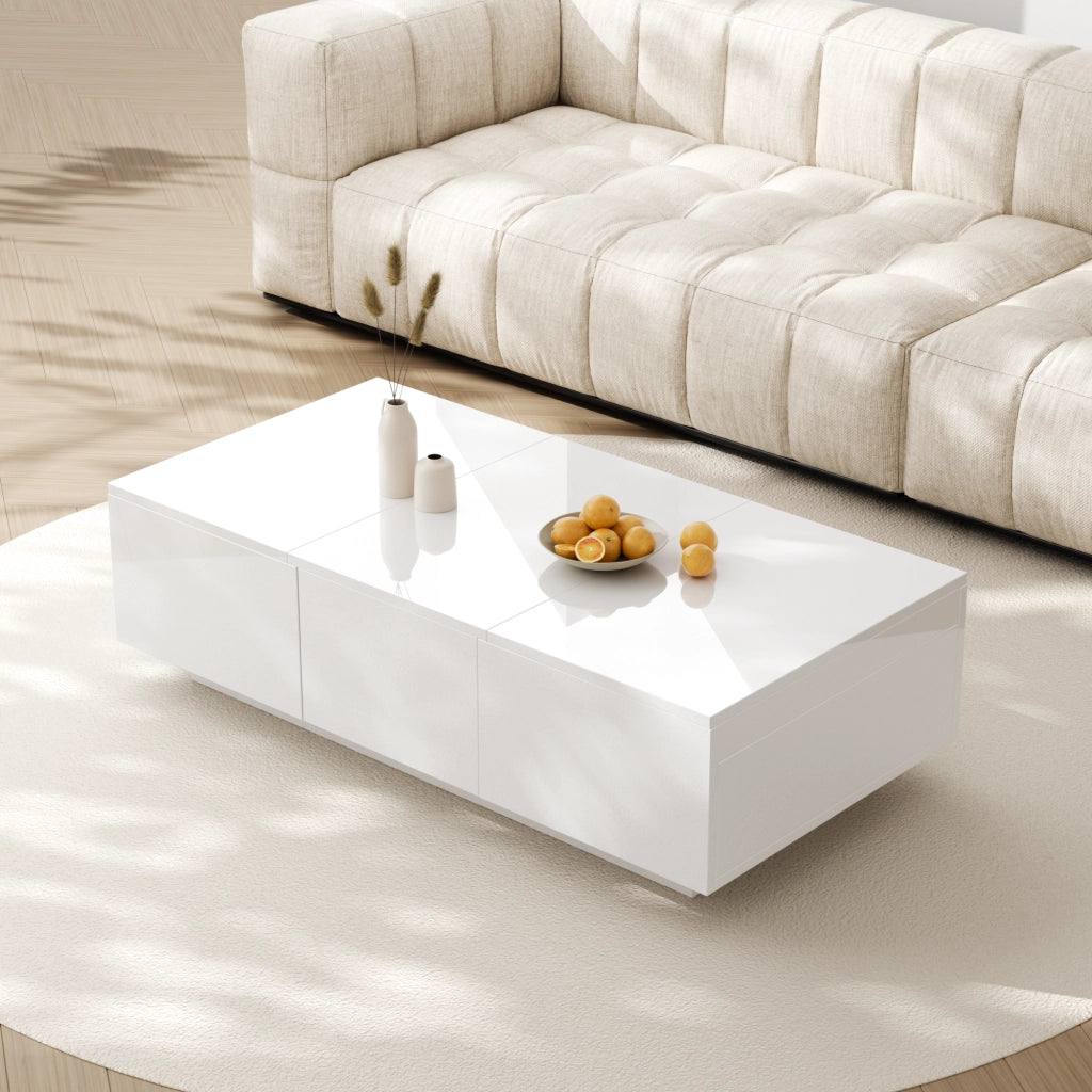 Tavolino da caffè 100x50x31 cm; vani nascosti e cassetti; truciolare bianco