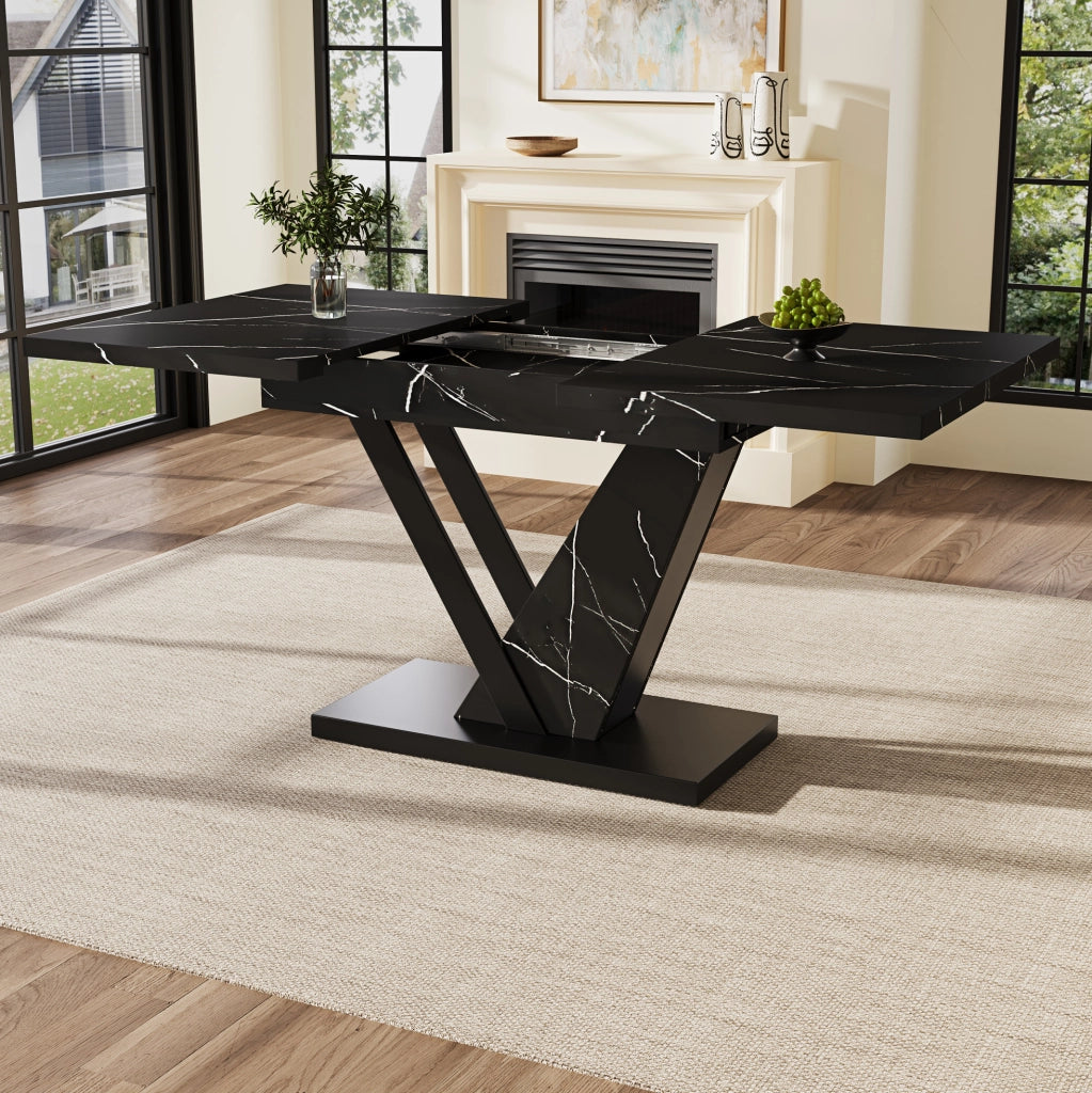 Tavolo da pranzo allungabile 120x75x75.5 cm; design telescopico con piano marmorizzato; MDF e metallo nero