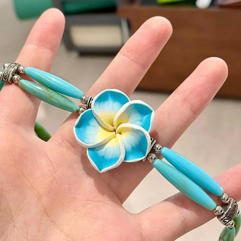 Collana fatta a mano con perline di cristallo e frangipani blu, regalo di Natale o compleanno.