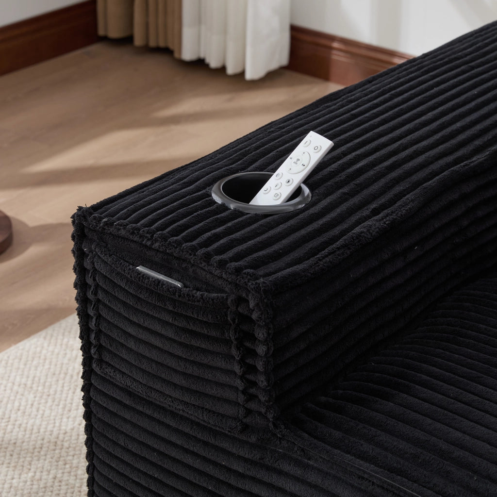 Divano modulare 4 posti in velluto a coste nero con 2 pouf, portabicchieri e tasche laterali