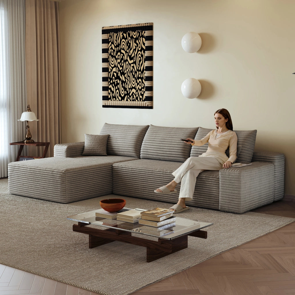 Divano angolare modulare con chaise longue e seduta profonda senza montaggio, in tessuto e schiuma, cammello