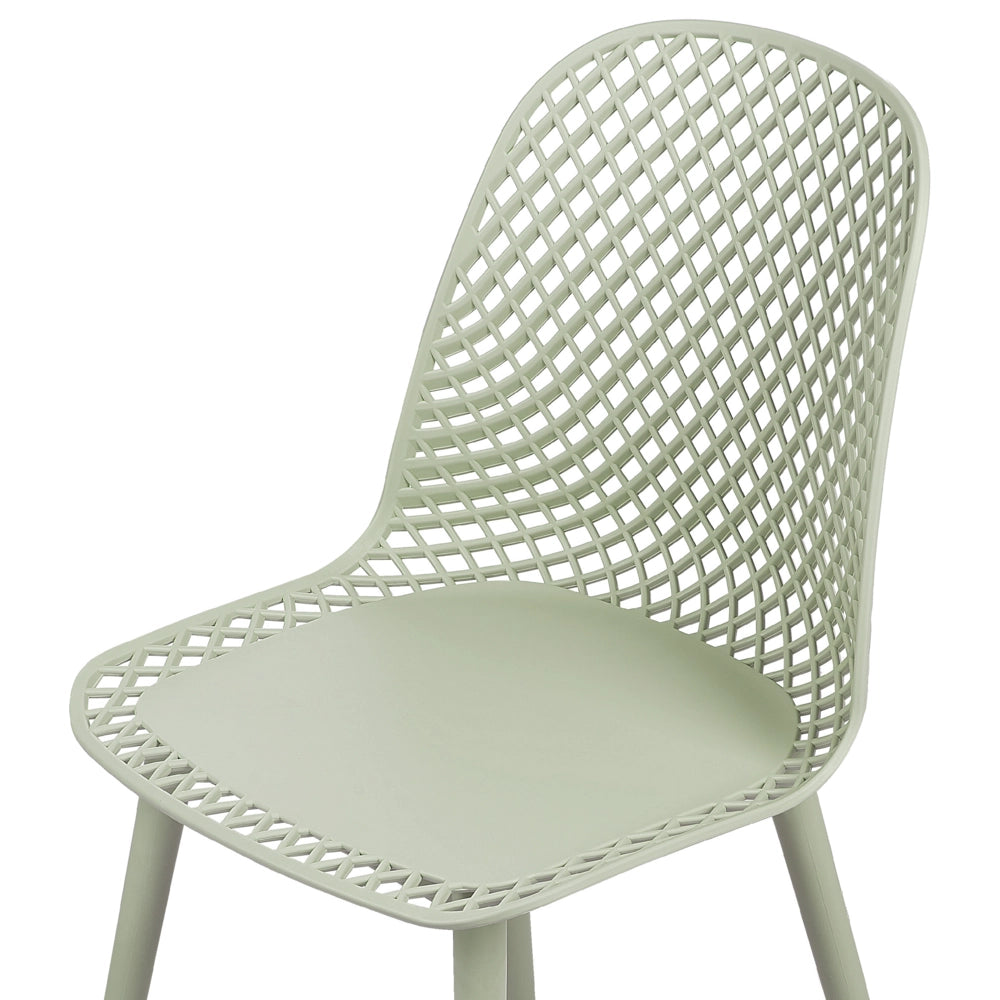 Set di 4 sedie da pranzo Seduta e gambe sintetiche verde chiaro Schienale a rete aperto Design moderno e minimalista