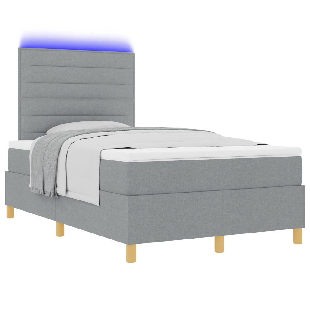 Letto box spring con materasso e luce LED grigio chiaro 120x190 cm in tessuto