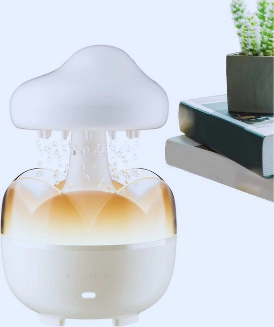 Umidificatore per l'aria con 7 colori di illuminazione & suono della pioggia - Macchina di aromaterapia con telecomando - Ideale per camera da letto - soggiorno e relax