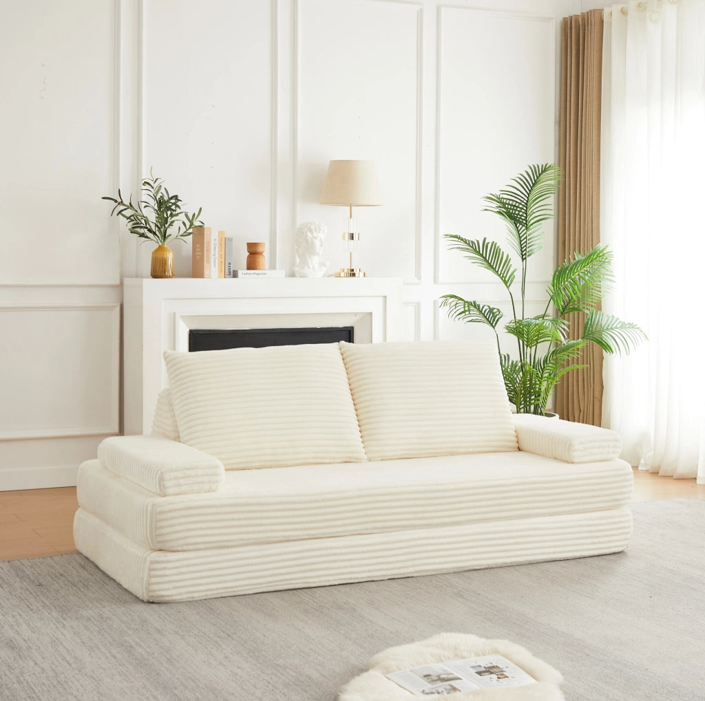 Divano modulare ULEVR 211,5 cm in velluto a coste beige con schienali triangolari e braccioli mobili