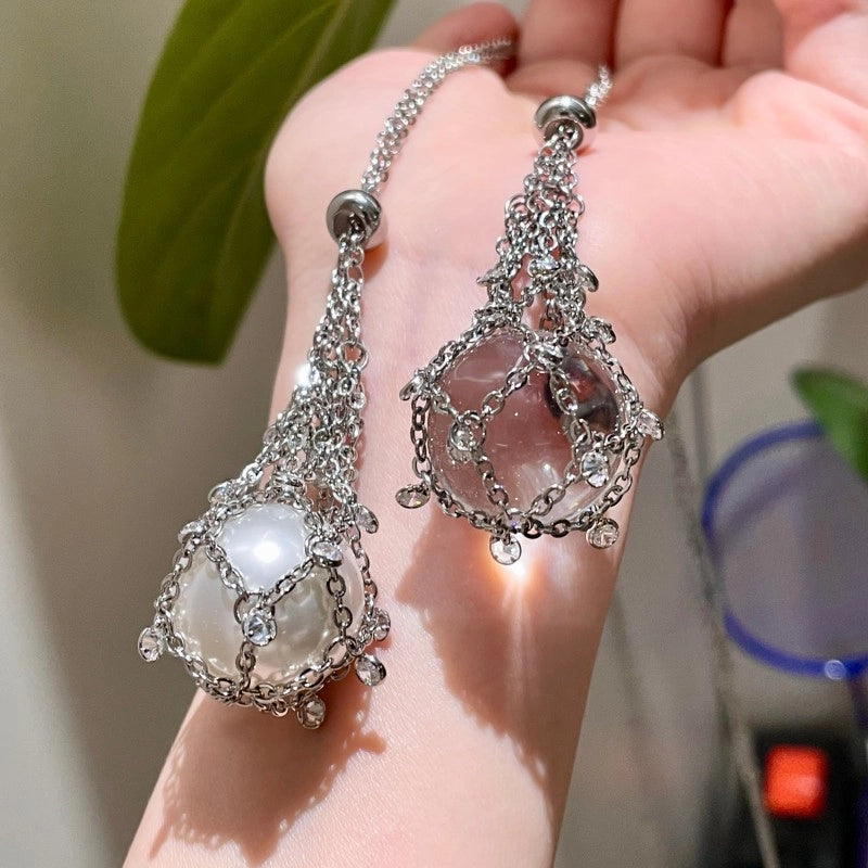 Collana con pendente a goccia in zirconi e nappa, catena per clavicola con perle di cristallo.