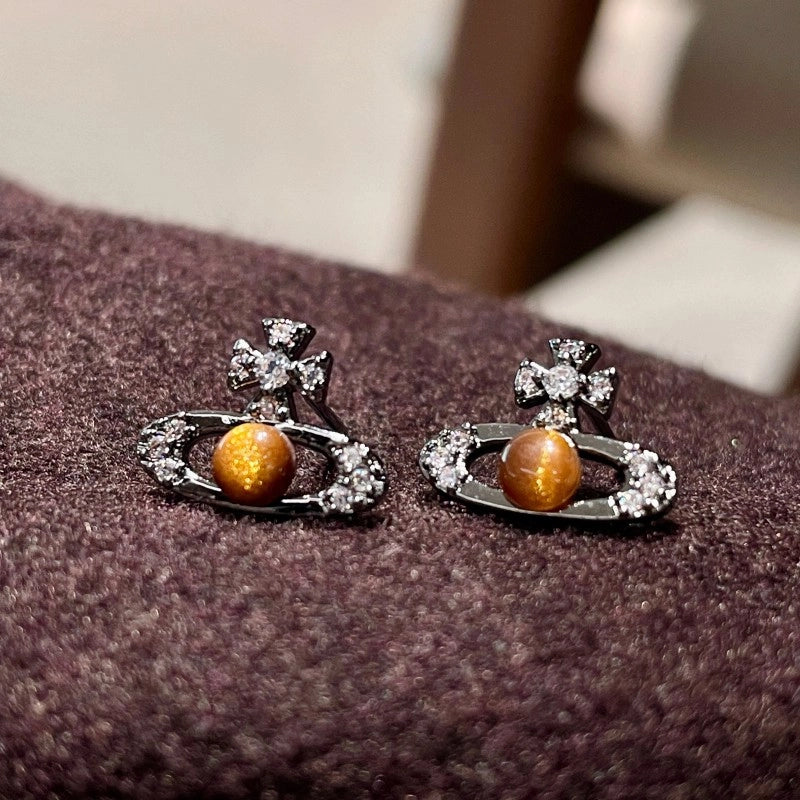 Orecchini a spillo in argento S925 dallo stile dolce e raffinato; orecchini a lobo con occhio di tigre in cristallo nero.