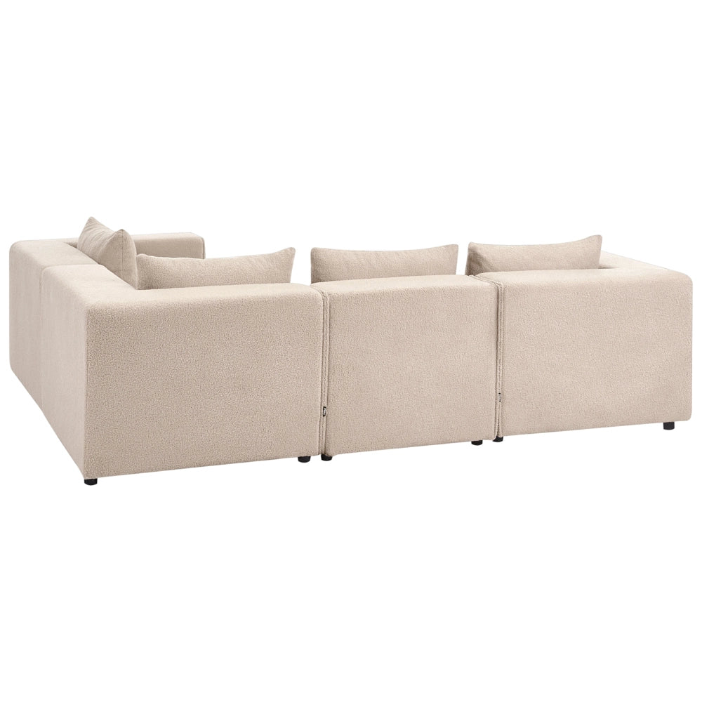 Divano a 4 posti in tessuto bouclè modulare beige lato sinistro stile minimale moderno