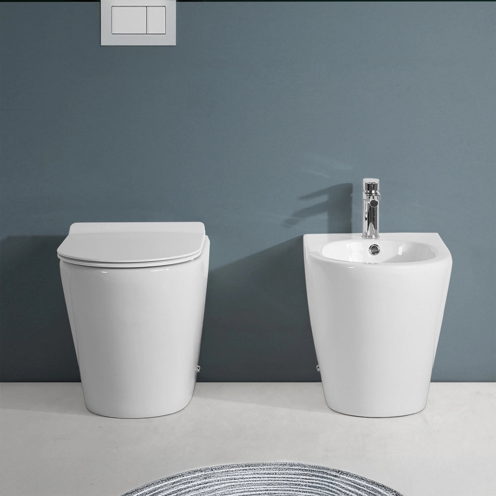 Copriwater bianco design tondo con chiusura soft close e sgancio rapido per sanitari Ukra