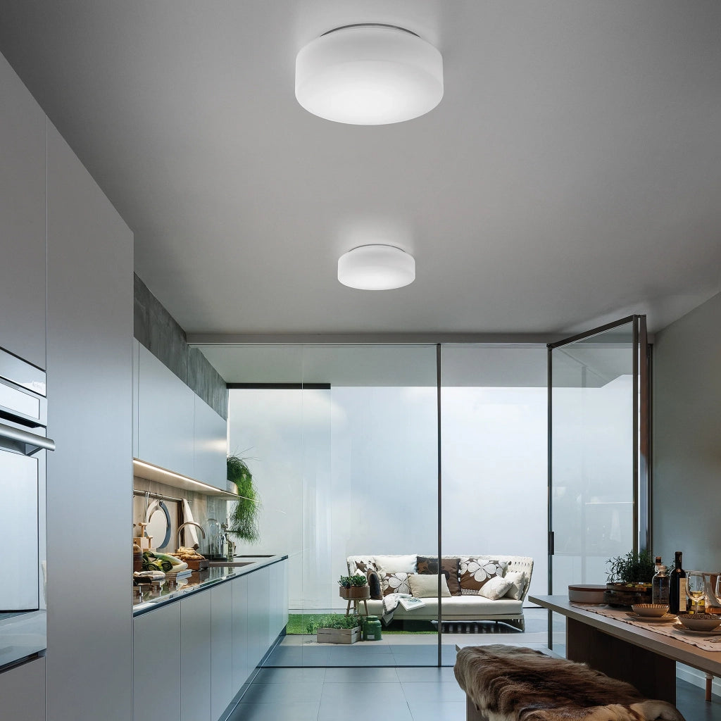 Drum parete/soffitto ø.300x100mm. 1xe27 42w hs-ip44- base neutra,vtr.b.co