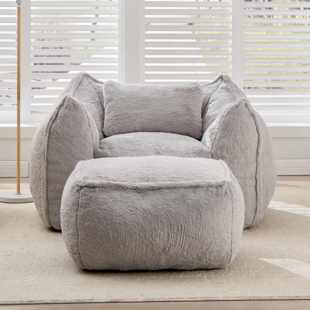 Pouf poltrona ergonomico con poggiapiedi e imbottitura in schiuma, per soggiorno, in pelliccia sintetica grigio