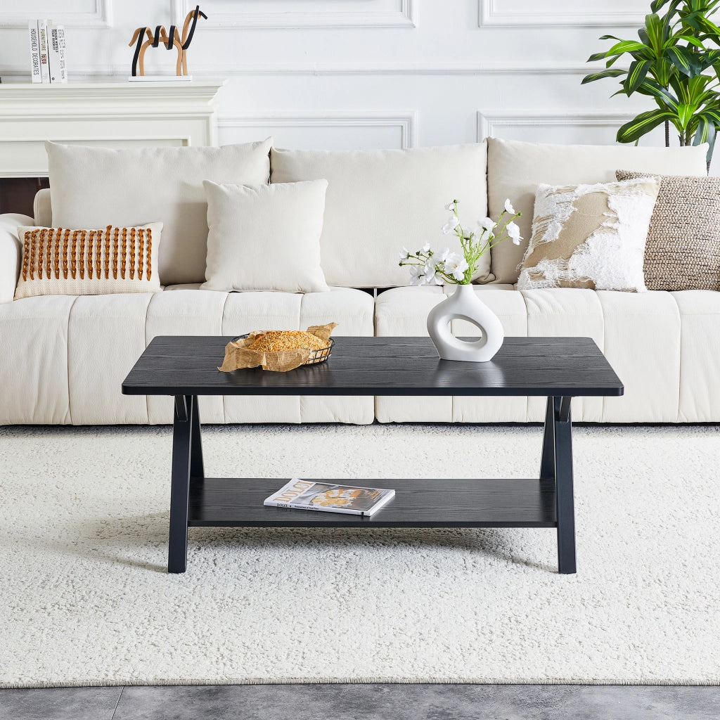 Tavolino basso con ripiano portaoggetti, effetto legno nero e struttura in metallo, per soggiorno, 110 × 57 × 44,5 cm