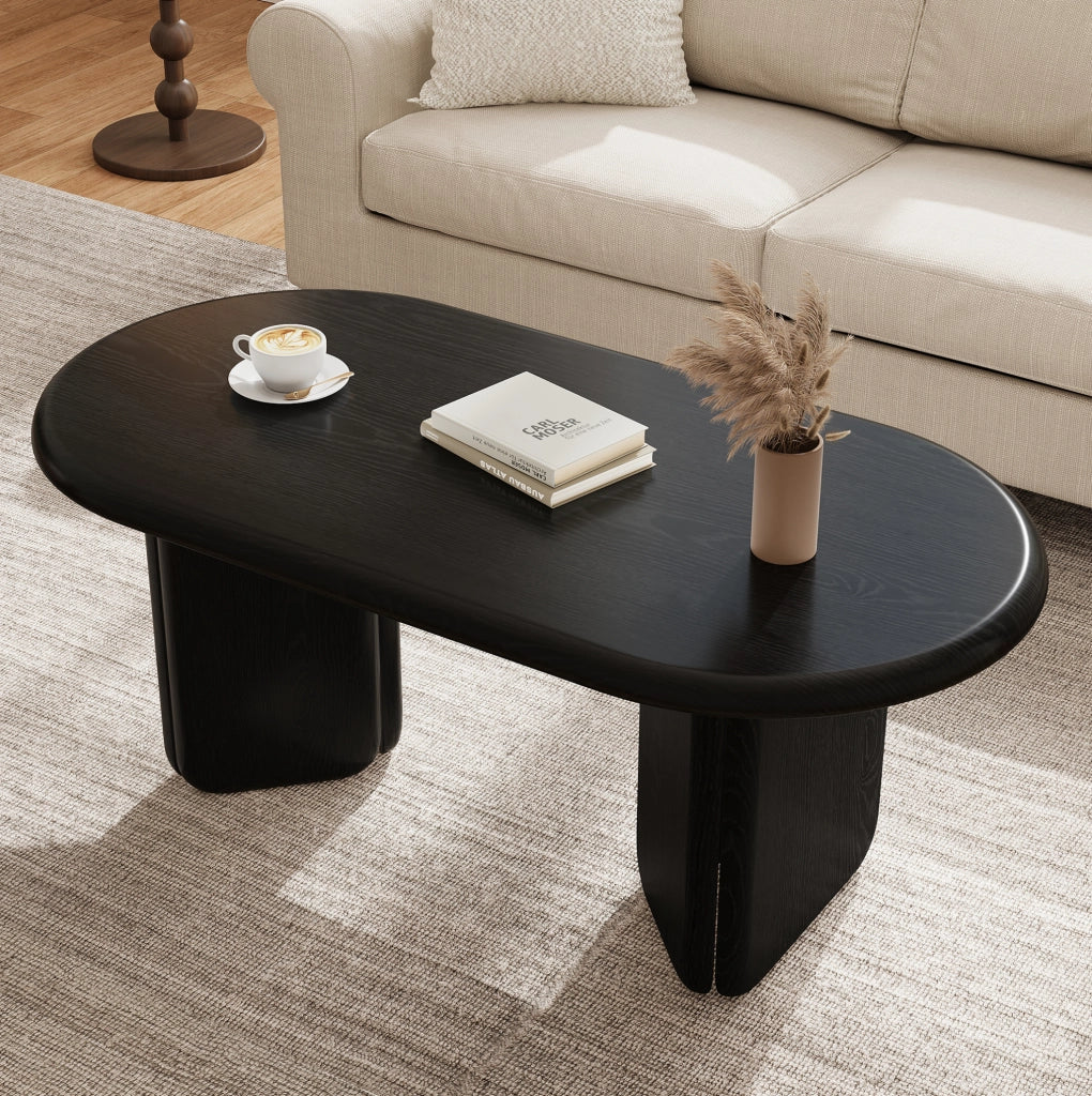 Tavolino da caffè ovale 99x50x40 cm in MDF nero con gambe arrotondate