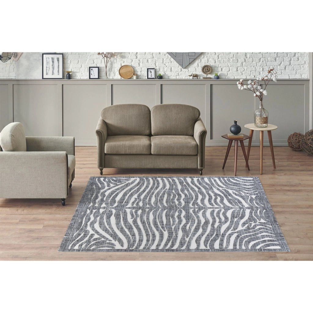 Tappeto moderno Sarai con motivo zebrato in grigio