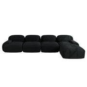 Divano angolare modulare in velluto a coste; seduta ergonomica; braccioli curvi; senza montaggio; nero