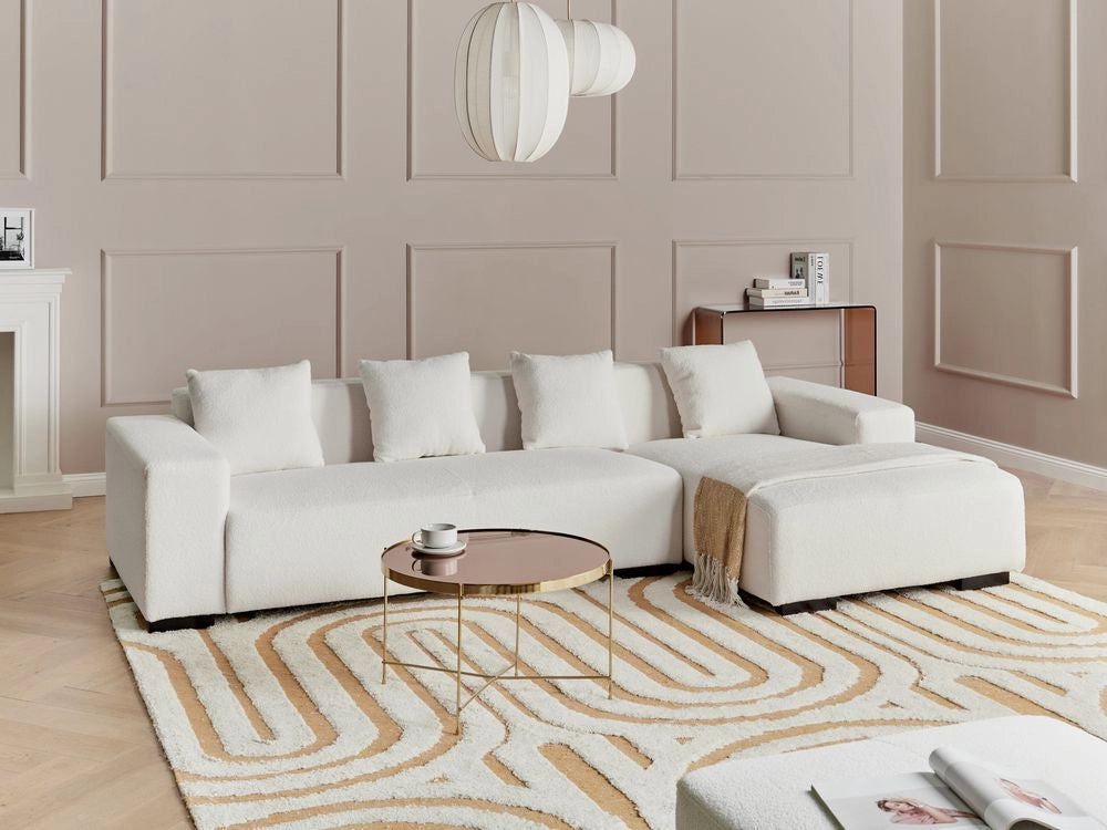 Divano angolare 4 posti in tessuto bouclè bianco lato sinistro forma a L stile elegante
