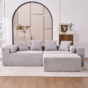 Divano angolare modulare senza attrezzi con chaise longue e seduta oversize per salotto in tessuto chenille grigio