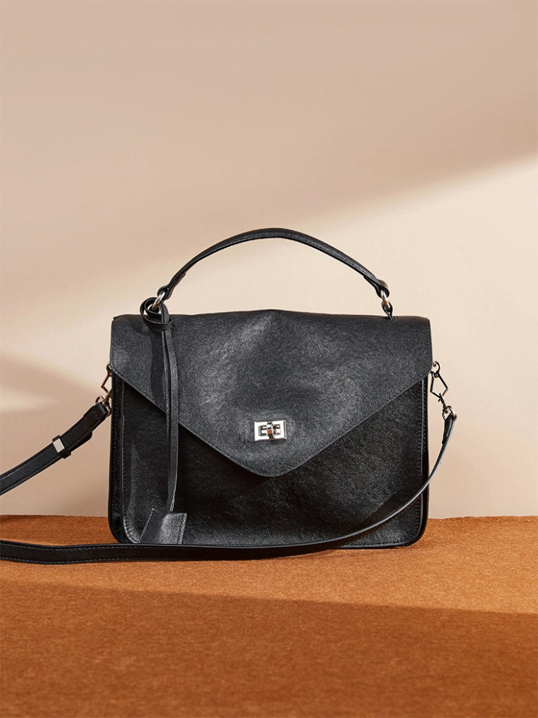 Borsa a mano media da donna in vera pelle, nera.