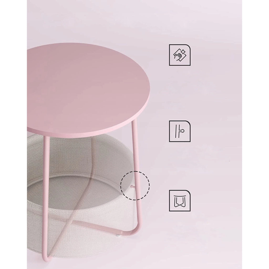 Tavolino rotondo moderno rosa pastello con cesto portaoggetti