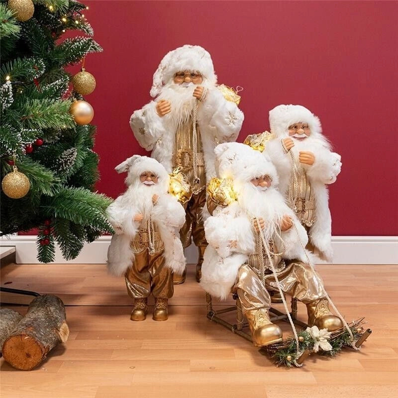 BABBO NATALE A PUPAZZO COLORE ORO BIANCOCON SACCO E 12 LED H62 CM
