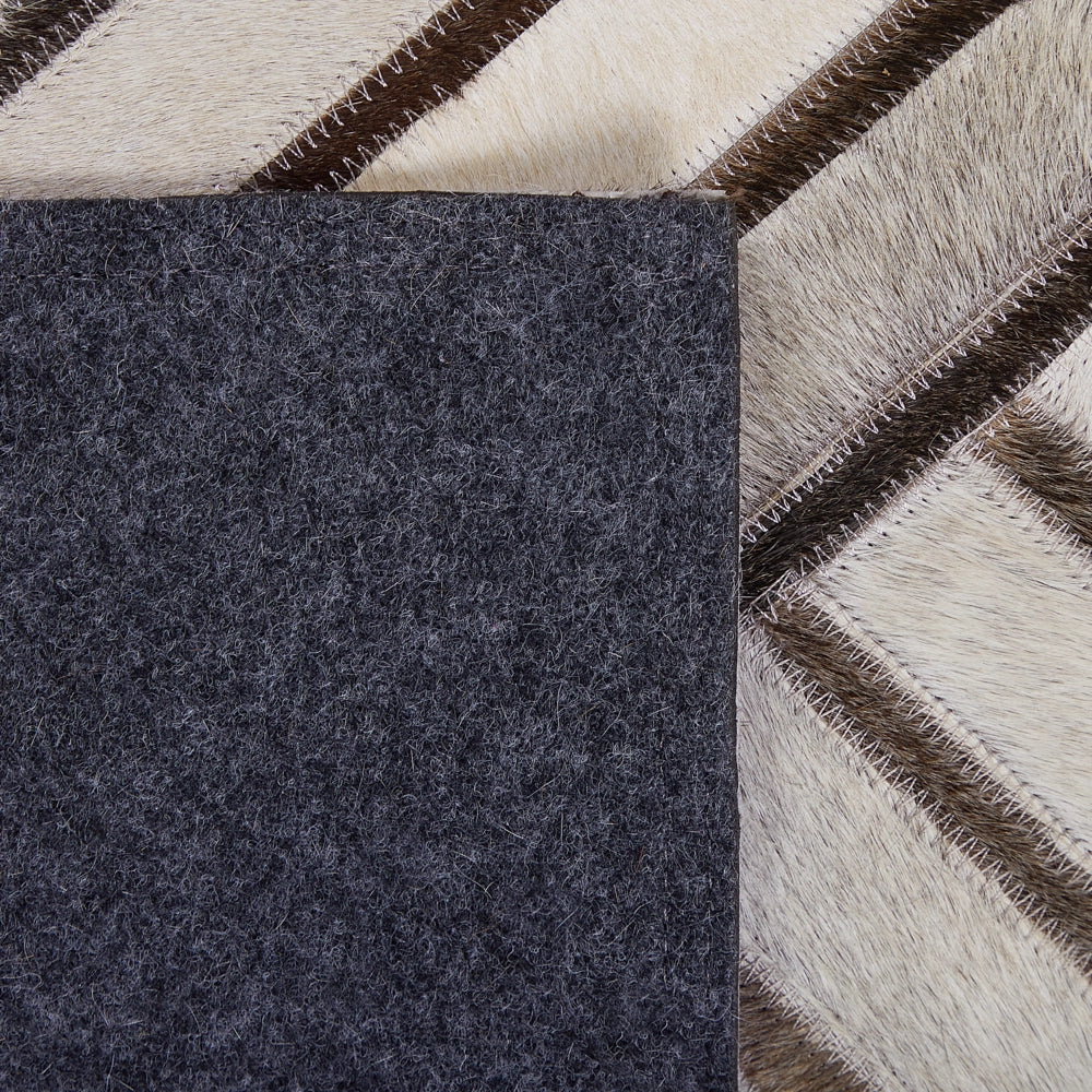 Tappeto in pelle di vacchetta Patchwork in pelle beige Motivo geometrico a rombi 140 x 200 cm