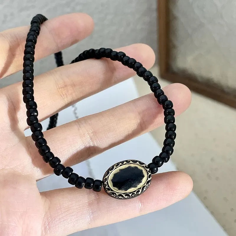 Collana vintage barocca con perline nere e oro, regalo di Natale o compleanno.