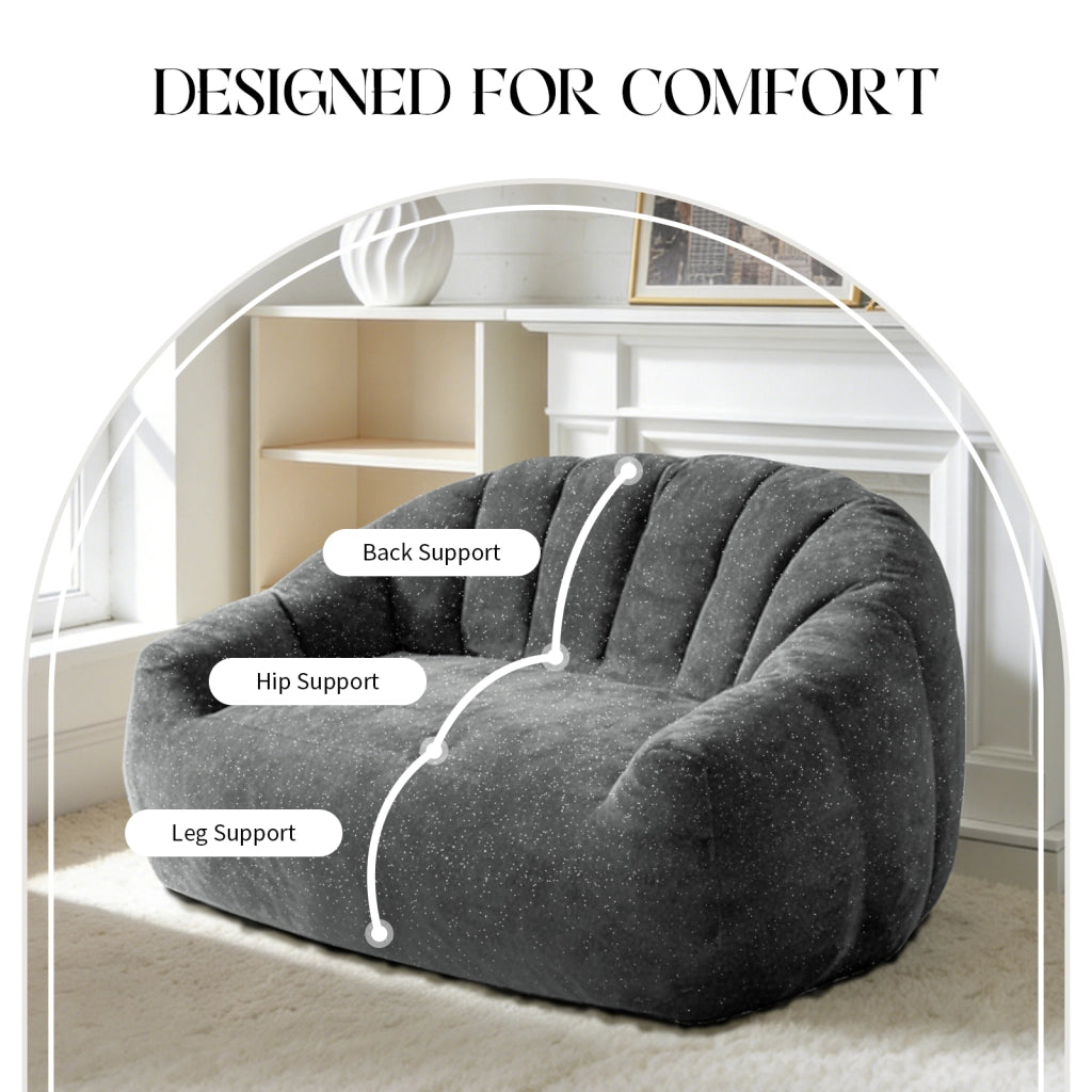 Pouf ergonomico con ampia seduta e linee fluide per soggiorno e camera da letto in flanella grigia
