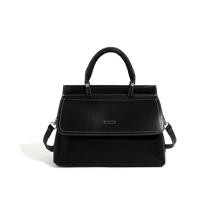 Borsa a mano da donna in vera pelle, colore nero.