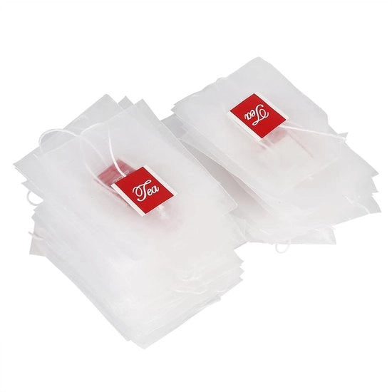 Set di 100 sacchetti per filtro a té in nylon trasparente, con cordoncino e dimensioni 7 x 6 cm