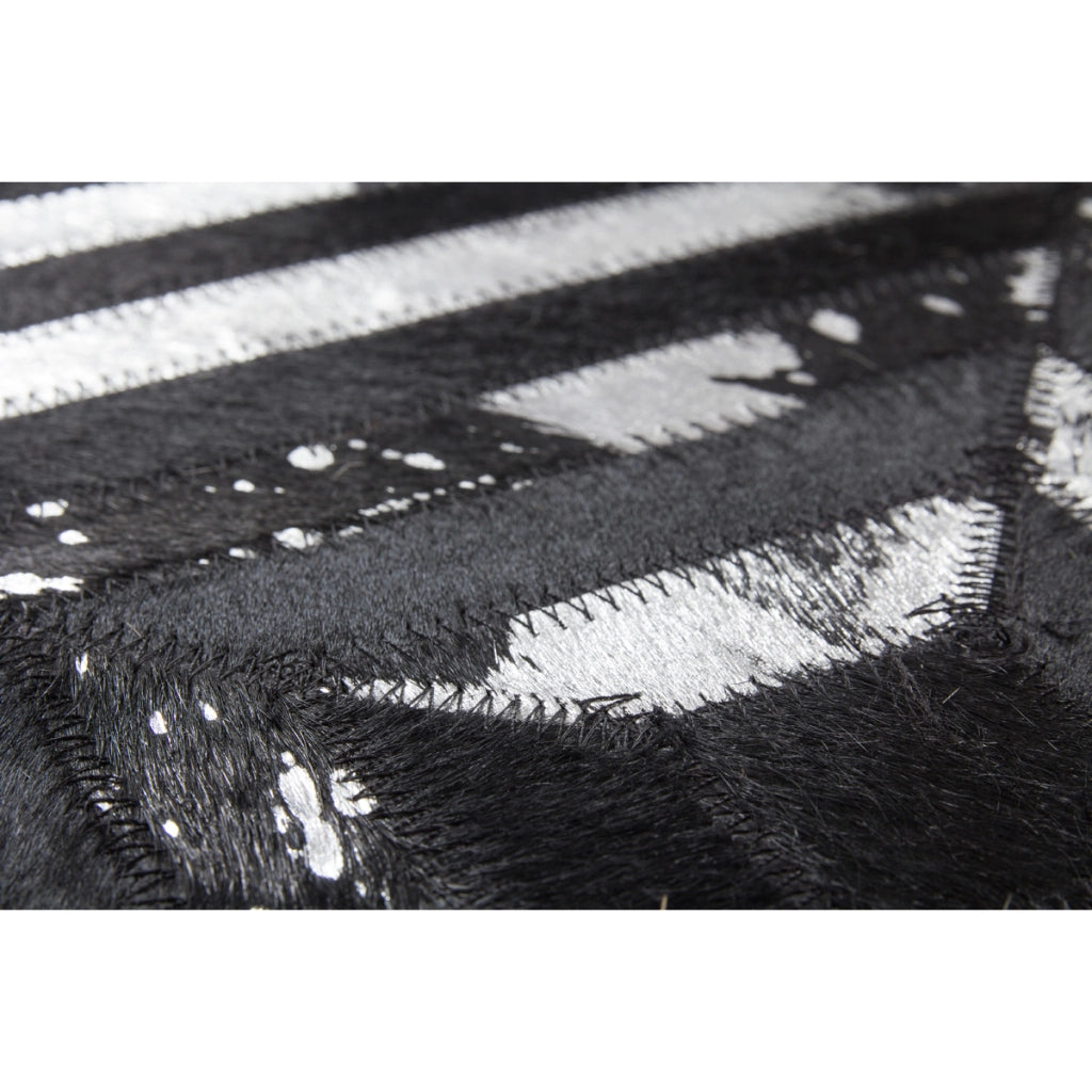 Pouf Spark in pelle con trama a rombi argento