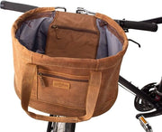 Stuoia portatile con cuscino da seduta in pelle marrone rimovibile con tasca per manubrio e cesta da picnic.