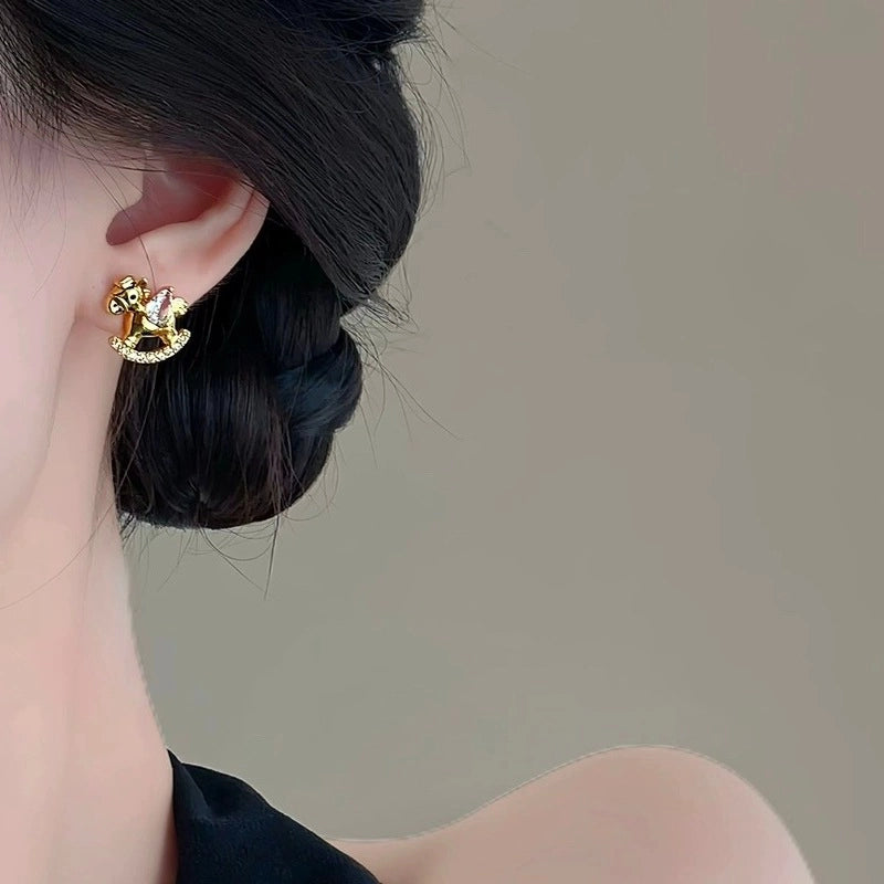 Orecchini Golden Pony con zirconi