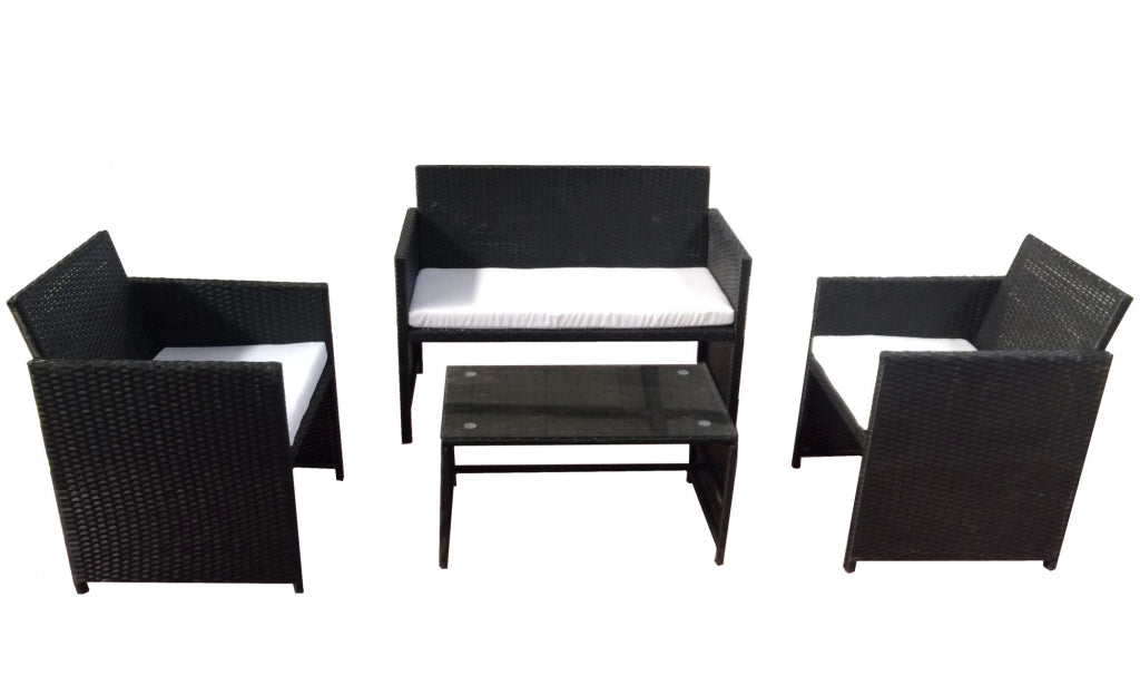 Salotto da esterno divano, due poltrone e tavolino, Polyrattan nero, cuscini bianchi  Fredi Cileva