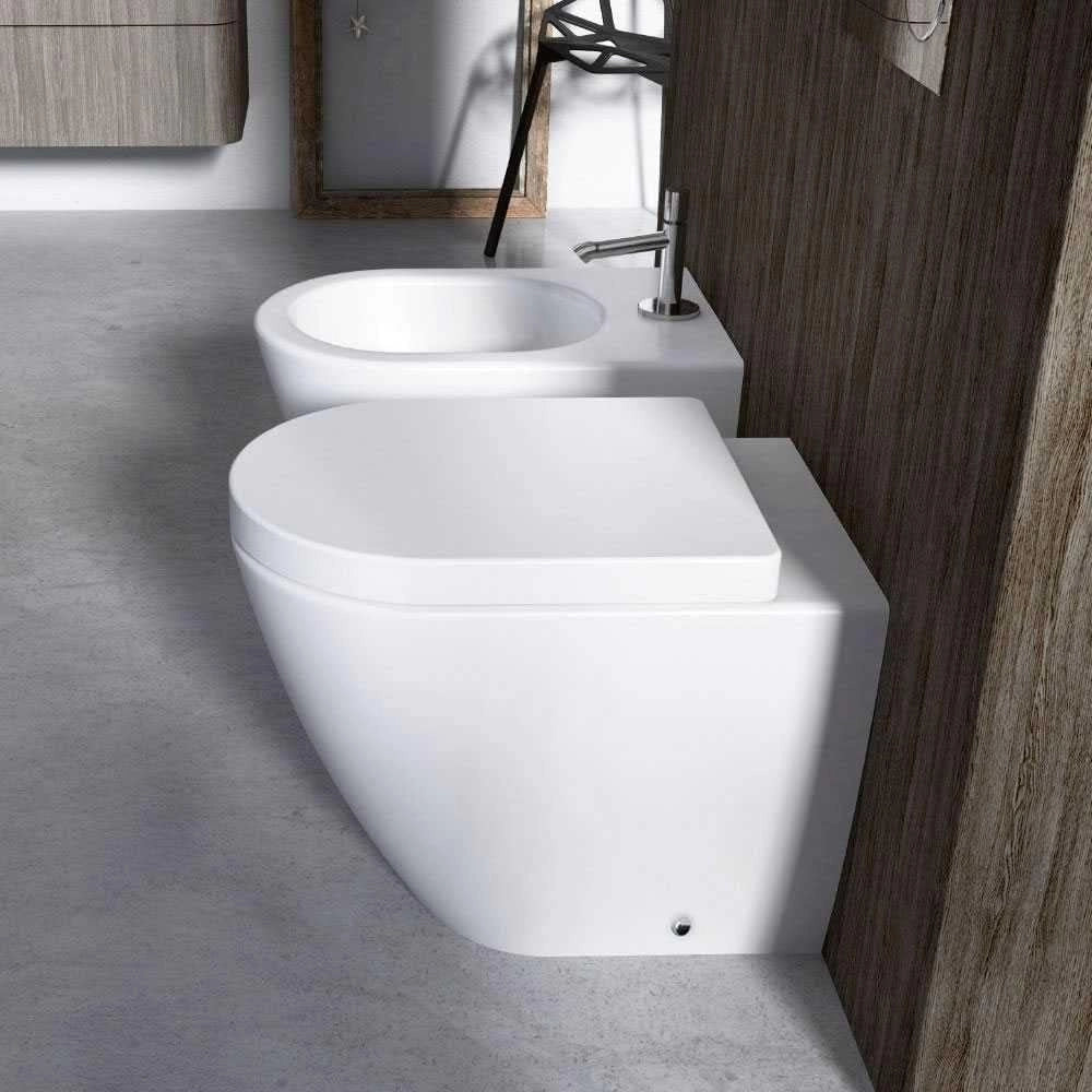 Sanitari filoparete senza brida Althea Cover in ceramica bianca wc+ bidet + sedile soft close slim