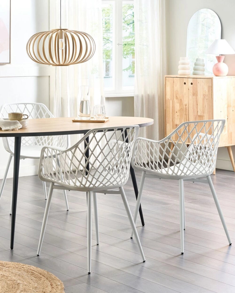 Set di 2 sedie da pranzo grigio sintetico sedile in legno chiaro gambe in metallo aperto netto indietro moderno soggiorno stile scandinavo