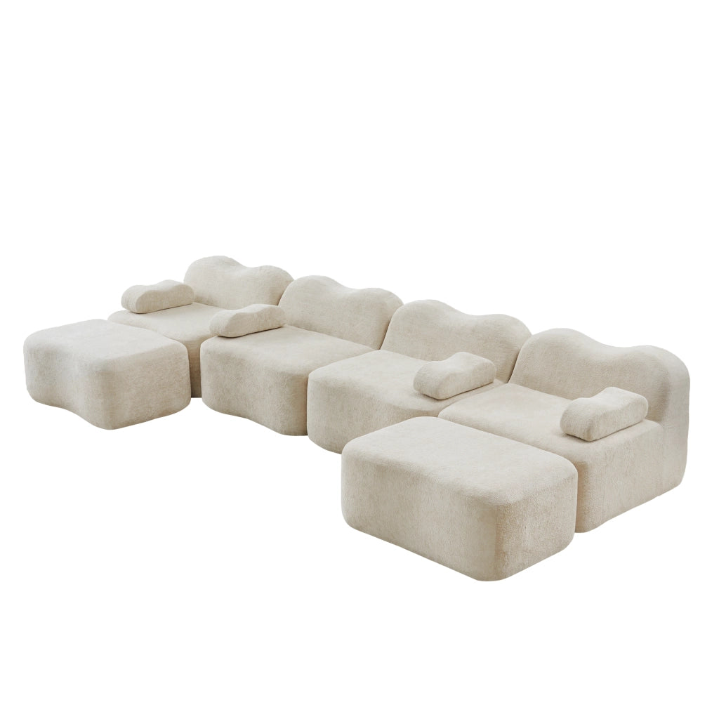 Divano modulare con forma ondulata e configurazione flessibile in velluto beige
