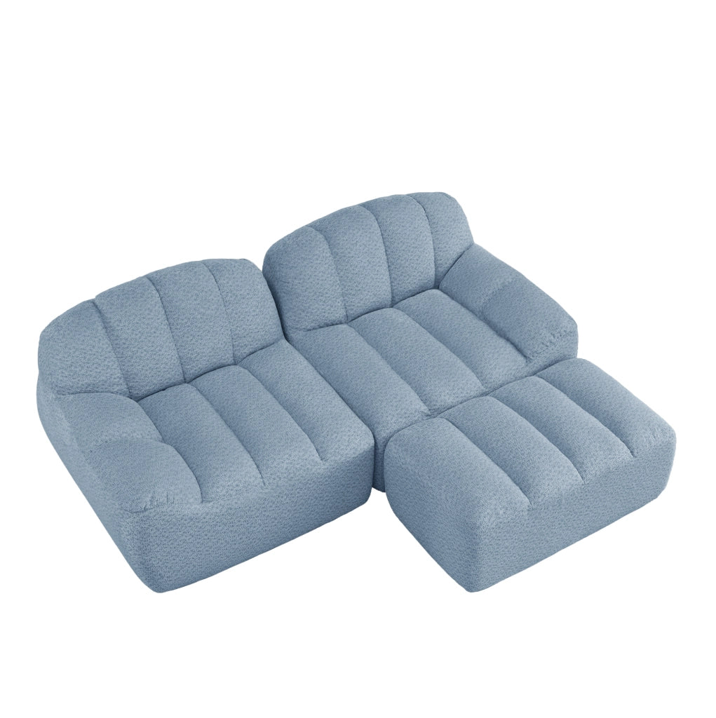 Divano modulare angolare 2 posti con pouf; senza struttura; in fleece granulato blu