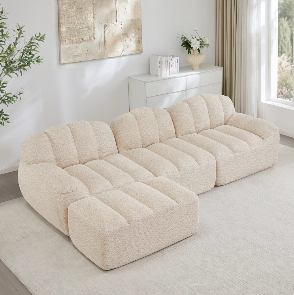 Divano modulare angolare 3 posti con pouf; 288x165x79 cm in fleece granulato beige bianco