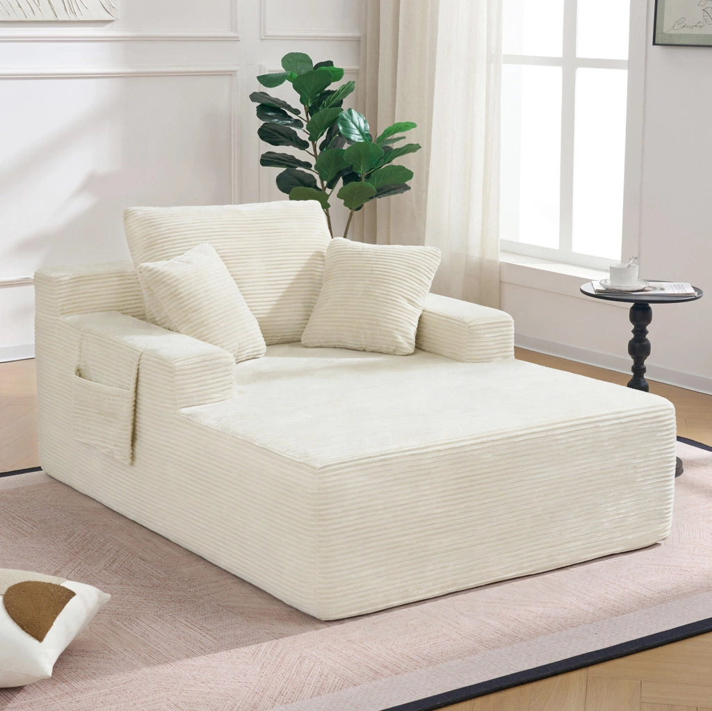 Divano ULEVR in velluto a coste beige con tasche laterali, cuscino schienale e 2 cuscini decorativi