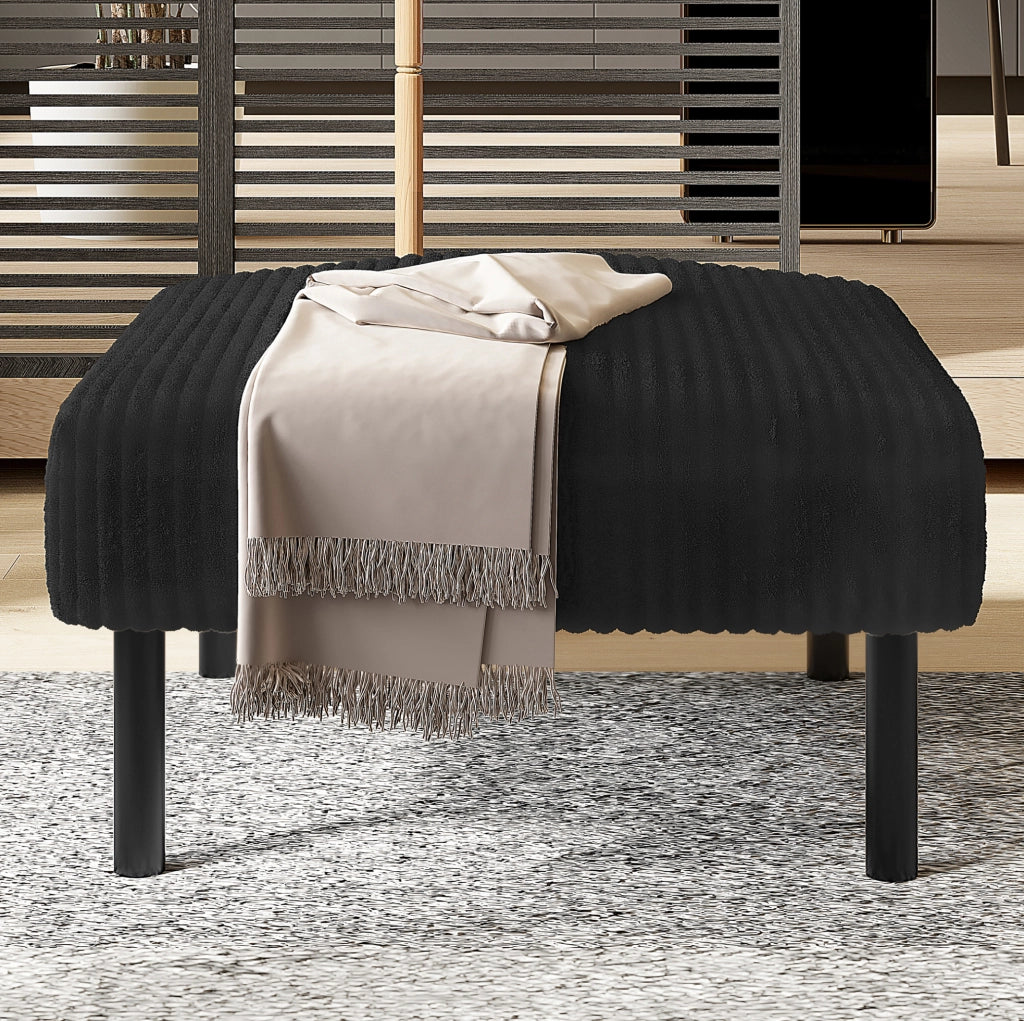 Pouf poggiapiedi ULEVR in velluto a coste nero con struttura in metallo, imbottito e versatile