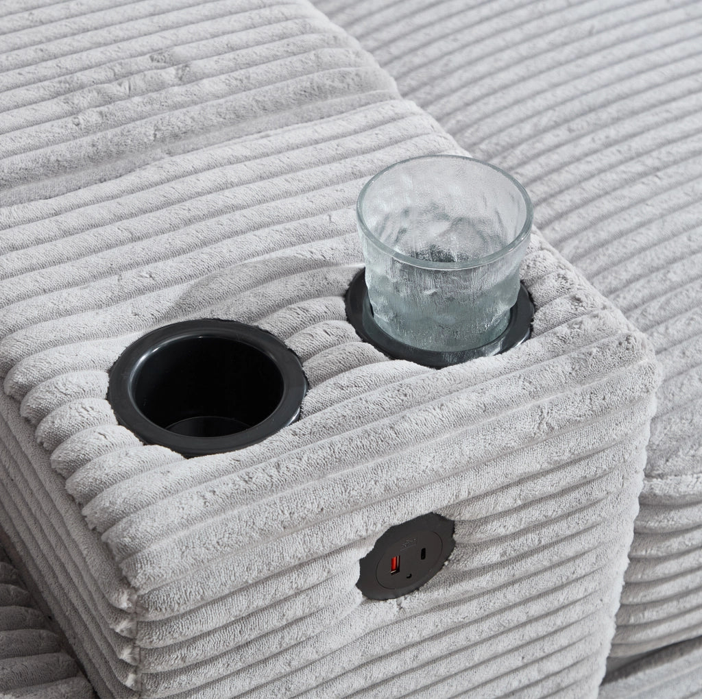 Divano modulare in corduroy grigio chiaro con memory foam; USB-C e pouf contenitore 266 cm