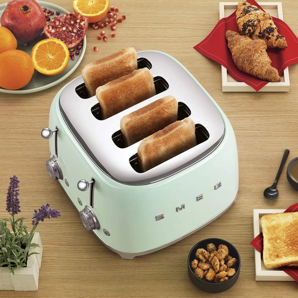 Smeg, tostapane 4x4 tsf03pgeu, 4 scomparti da 36mm, 6 livelli di doratura, funzione riscaldamento, scongelamento e bagel, espulsione automatica pane, 2 cassetti raccoglibriciole, 2000w, verde pastello