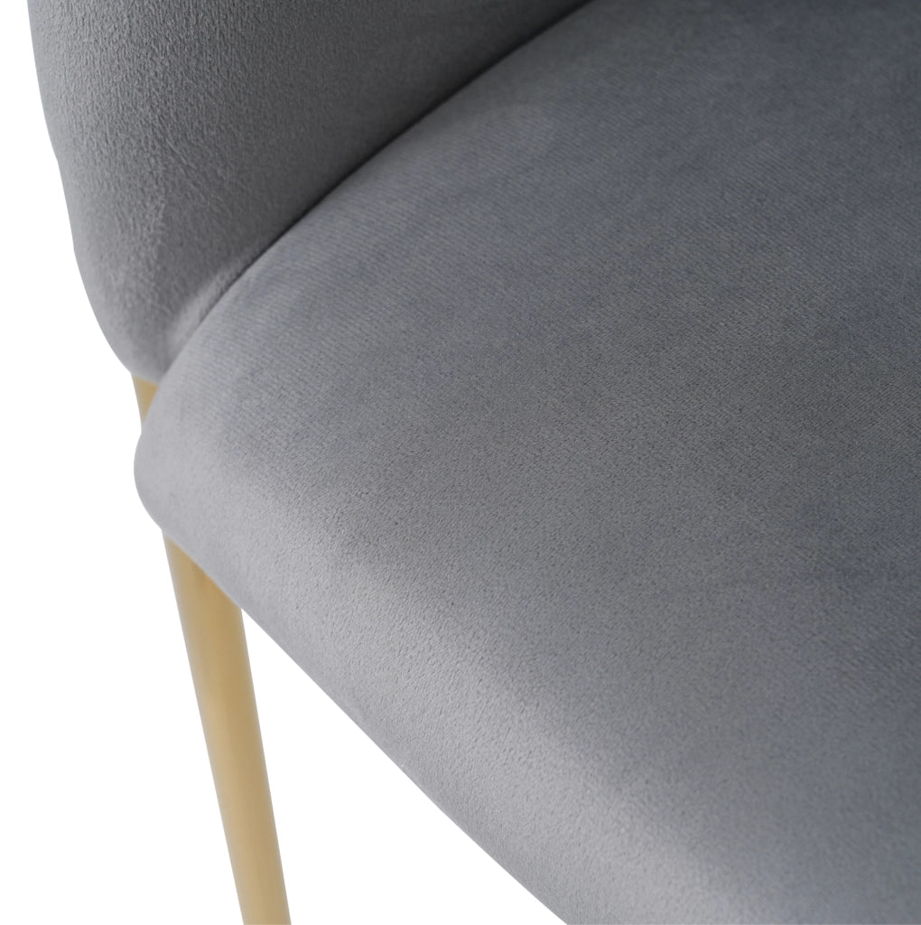 Sedia da pranzo singola in velluto grigio con gambe in metallo; stile moderno