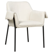 Poltrona da salotto con poggiatesta in tessuto beige con gambe nere elegante soggiorno glamour