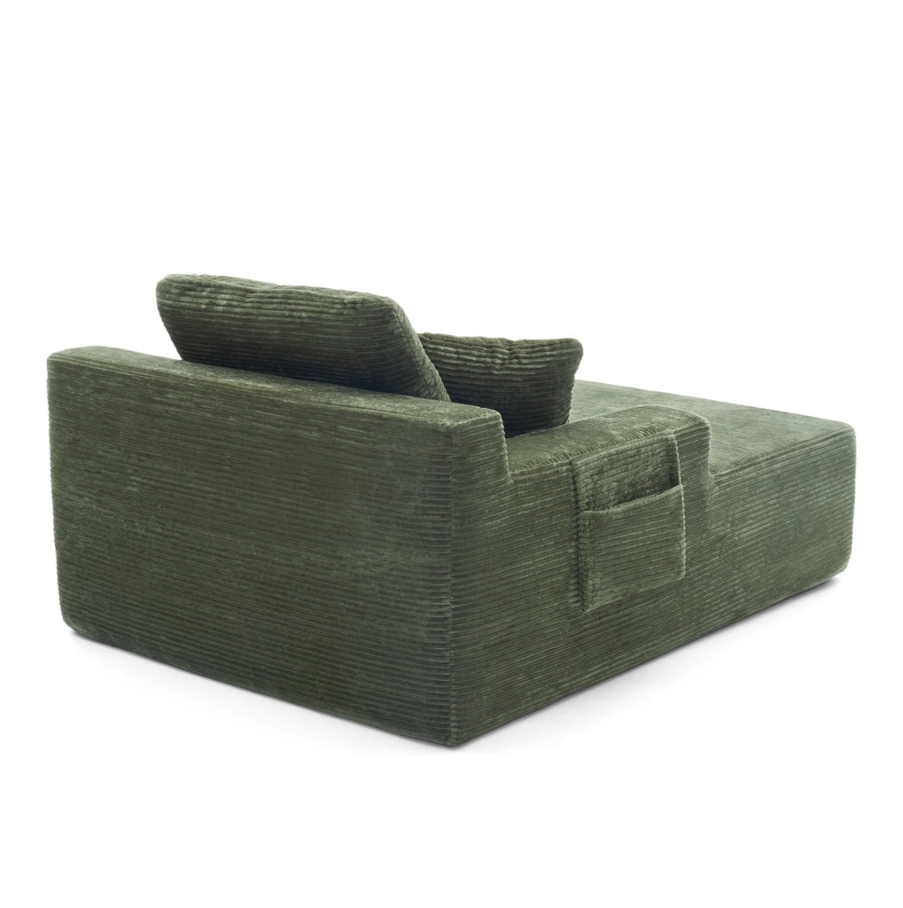 Divano compatto in velluto a coste verde con tasche laterali e imbottitura a molle per il relax