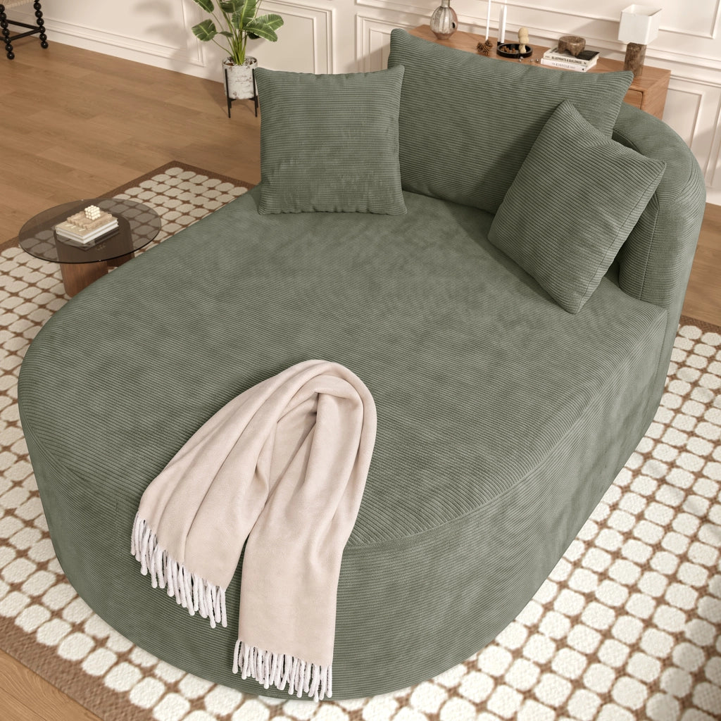 Poltrona relax ovale in corduroy con seduta profonda e forma avvolgente; verde