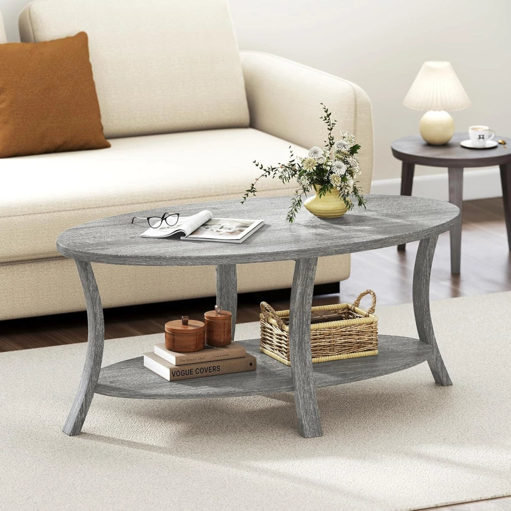 Tavolino da Caffè Ovale a 2 Livelli, Tavolino Basso da Salotto in Legno con Ampio Piano e Ripiano Aperto, Design Rustico per Soggiorno, Ufficio e Studio, 111 x 60,5 x 47 cm (Grigio)